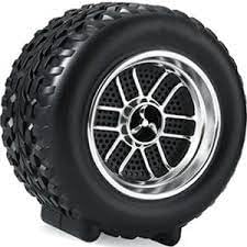 Transportable Bluetooth speaker in the shape of a tire, with strong bass and both indoor and outdoor use