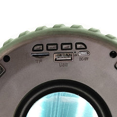 Transportable Bluetooth speaker in the shape of a tire, with strong bass and both indoor and outdoor use