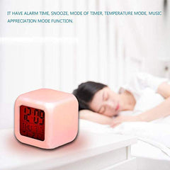 Tech nova-seven-color LED digital alarm clock table watch for office, bedroom, and date/time/temperature is made of plastic.