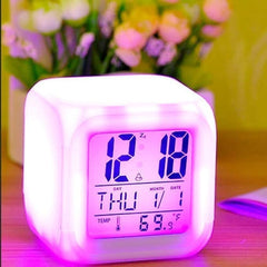 Tech nova-seven-color LED digital alarm clock table watch for office, bedroom, and date/time/temperature is made of plastic.